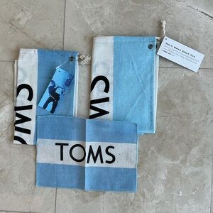 NWT (2) TOMS dust bags; (1) TOMS dust cloth